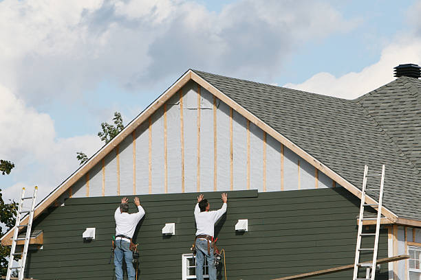 Professional Siding technician working in Reedsville, PA
